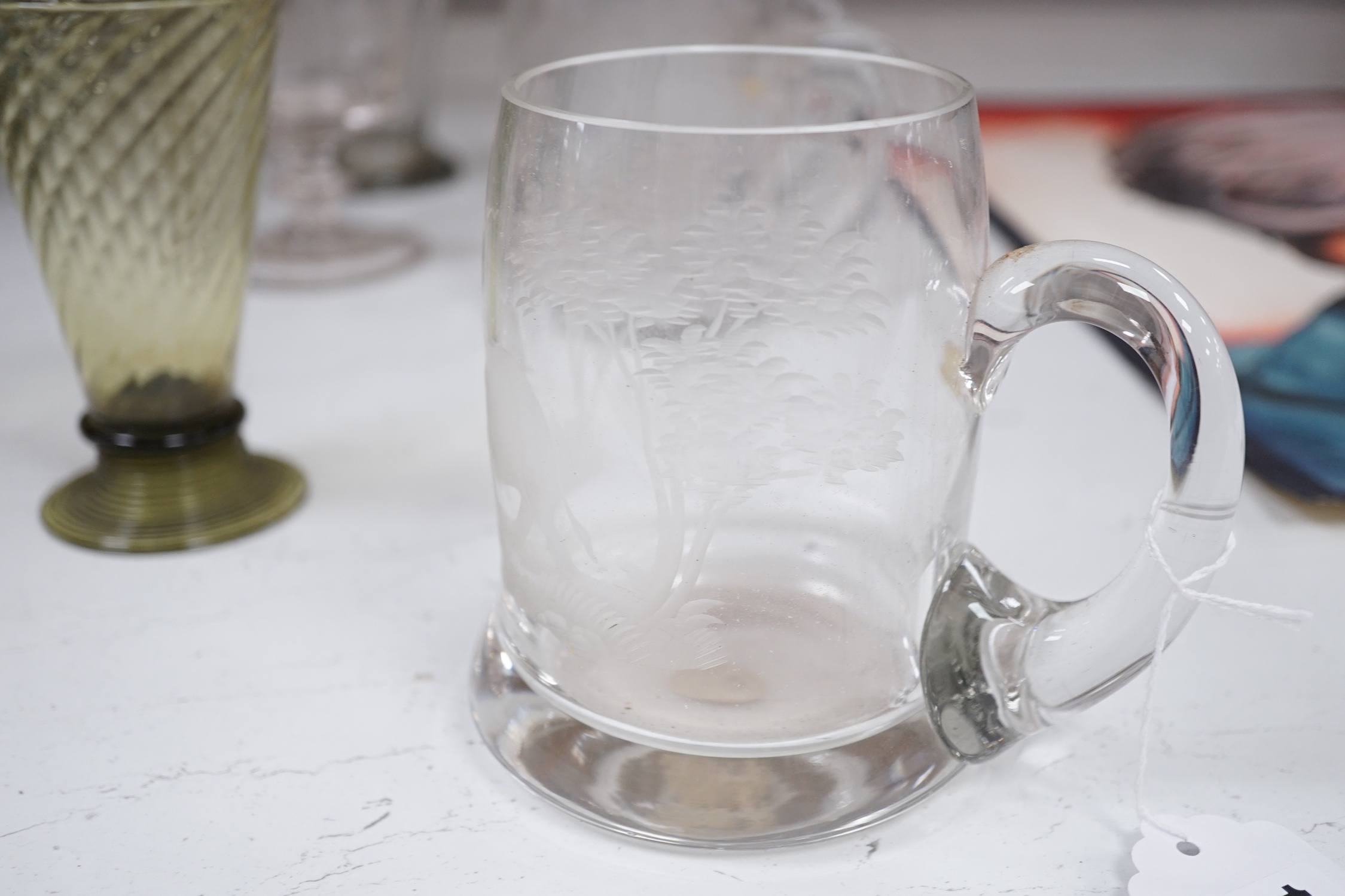 A set of four engraved glass mugs, a pair of rummers, an oval biscuit box etc